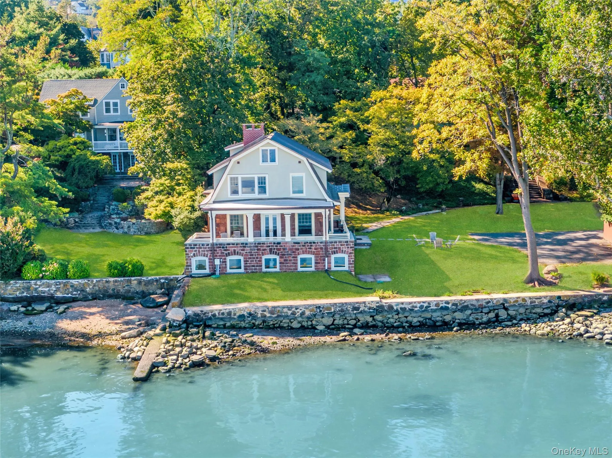 View of subject property with a large body of water View of subject property with a large body of water