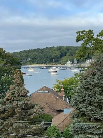 Water view featuring a forest Water view featuring a forest