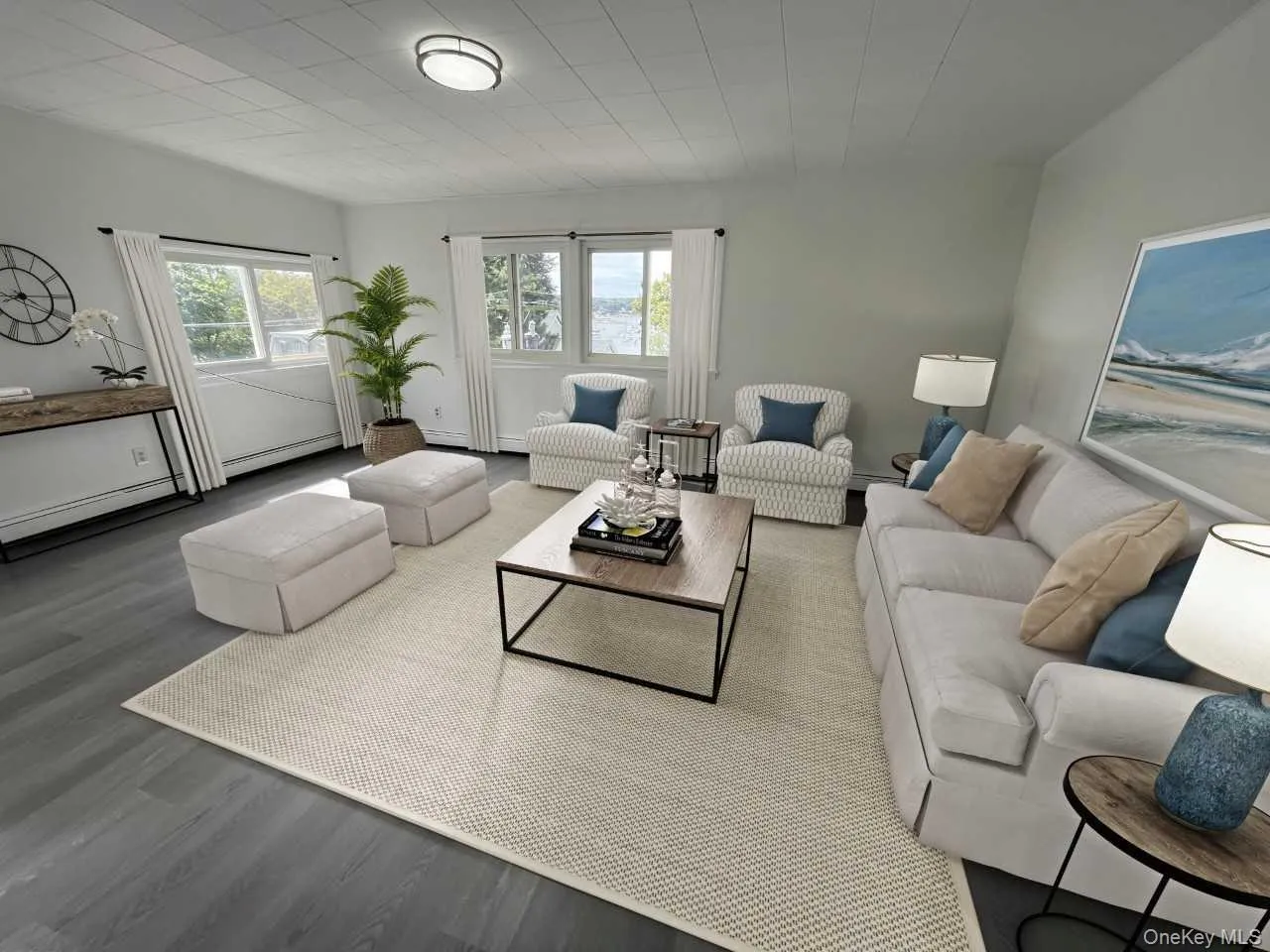 Living area with wood finished floors and a baseboard heating unit Living area with wood finished floors and a baseboard heating unit