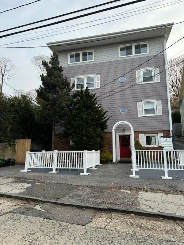 View of front of property with a fenced front yard View of front of property with a fenced front yard