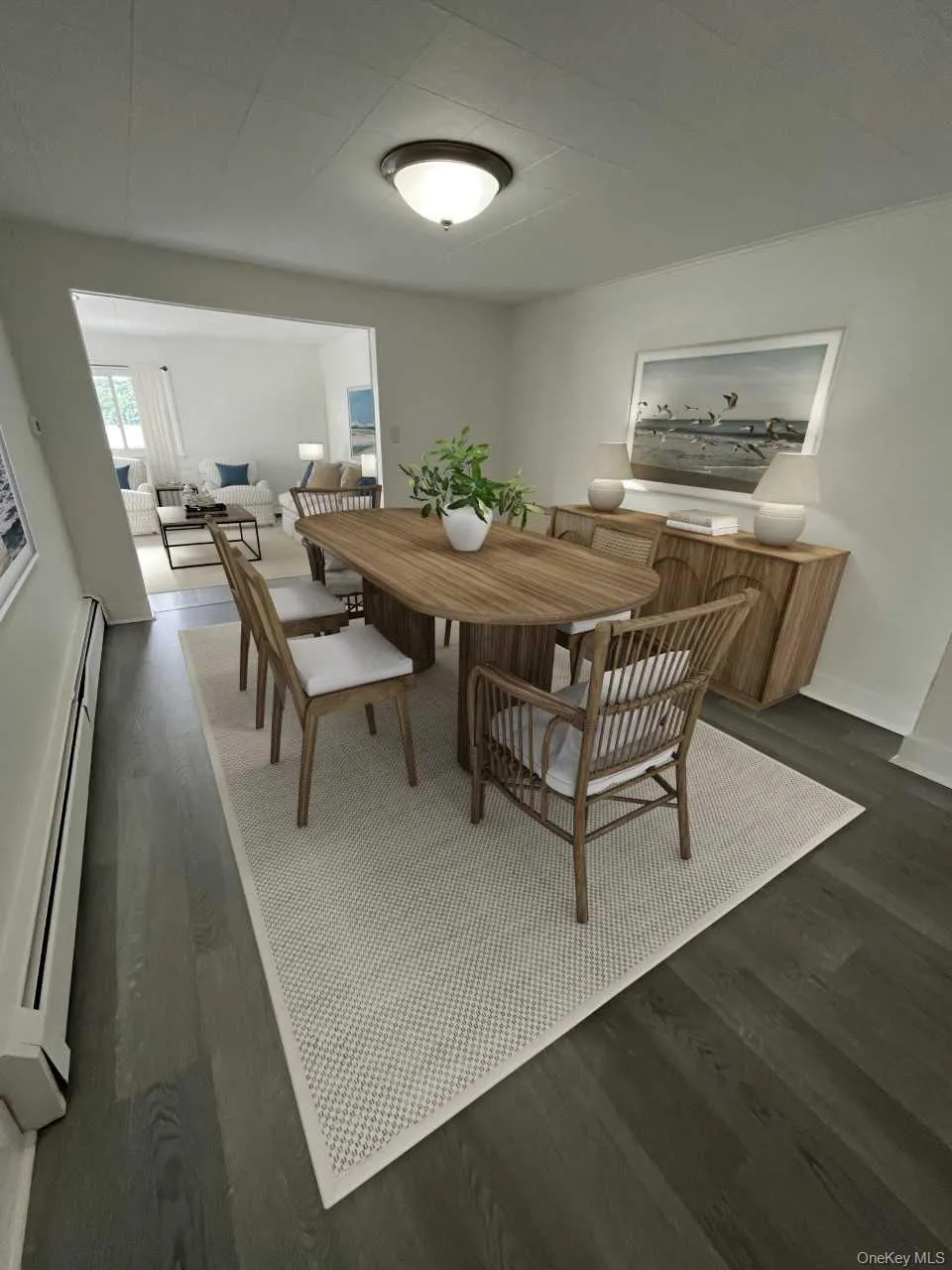 Dining room with dark wood-style flooring and baseboard heating Dining room with dark wood-style flooring and baseboard heating