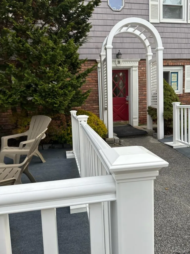 Property entrance featuring brick siding Property entrance featuring brick siding