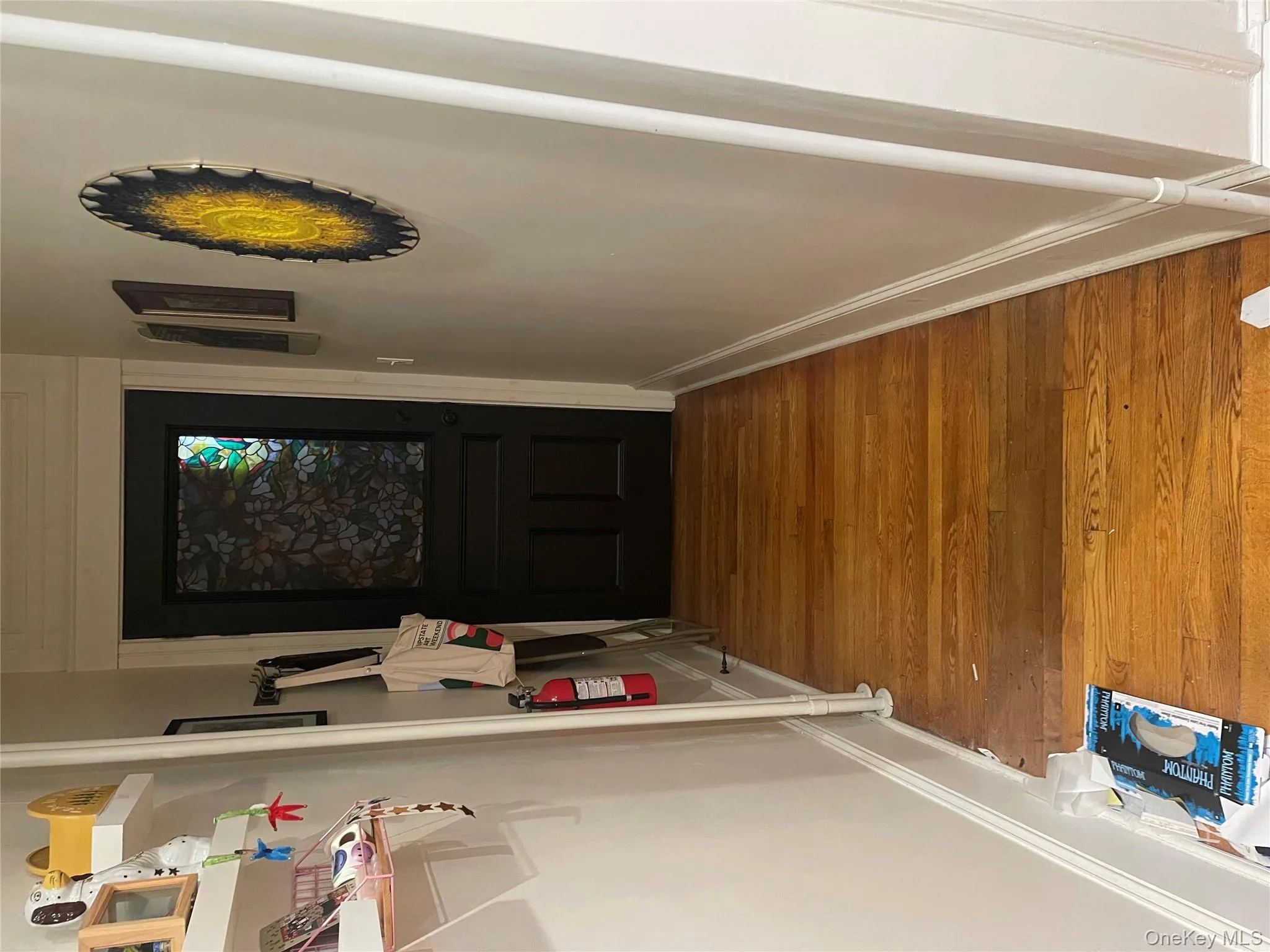 Entryway featuring wood finished floors and baseboards Entryway featuring wood finished floors and baseboards