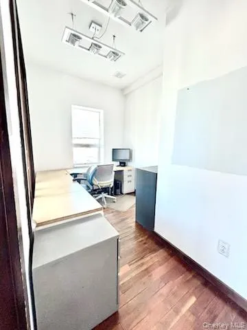 Office space featuring light wood finished floors Office space featuring light wood finished floors