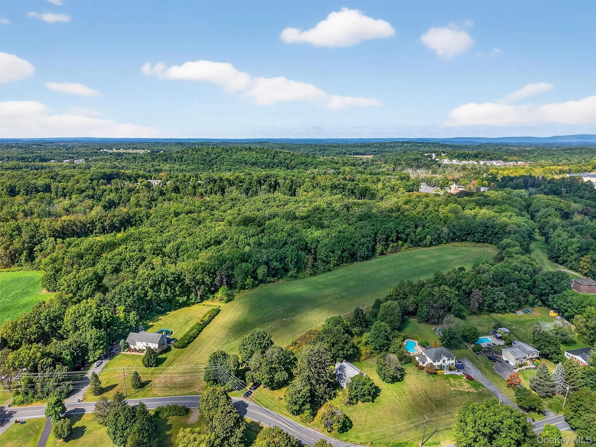 View of property location with a forest View of property location with a forest
