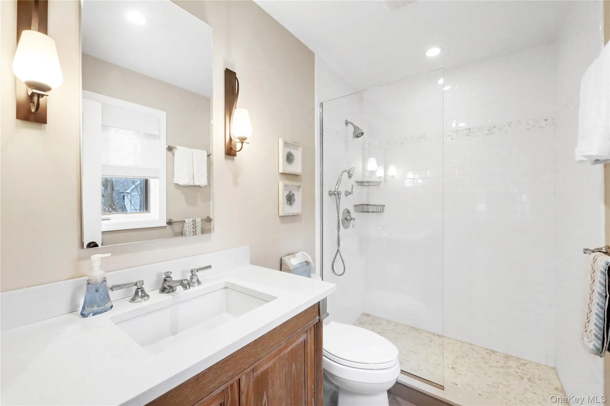 Bathroom featuring vanity, walk in shower, and recessed lighting Bathroom featuring vanity, walk in shower, and recessed lighting