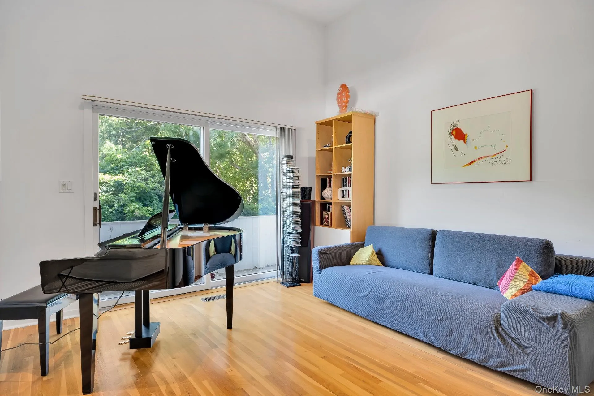 Living area with wood finished floors Living area with wood finished floors