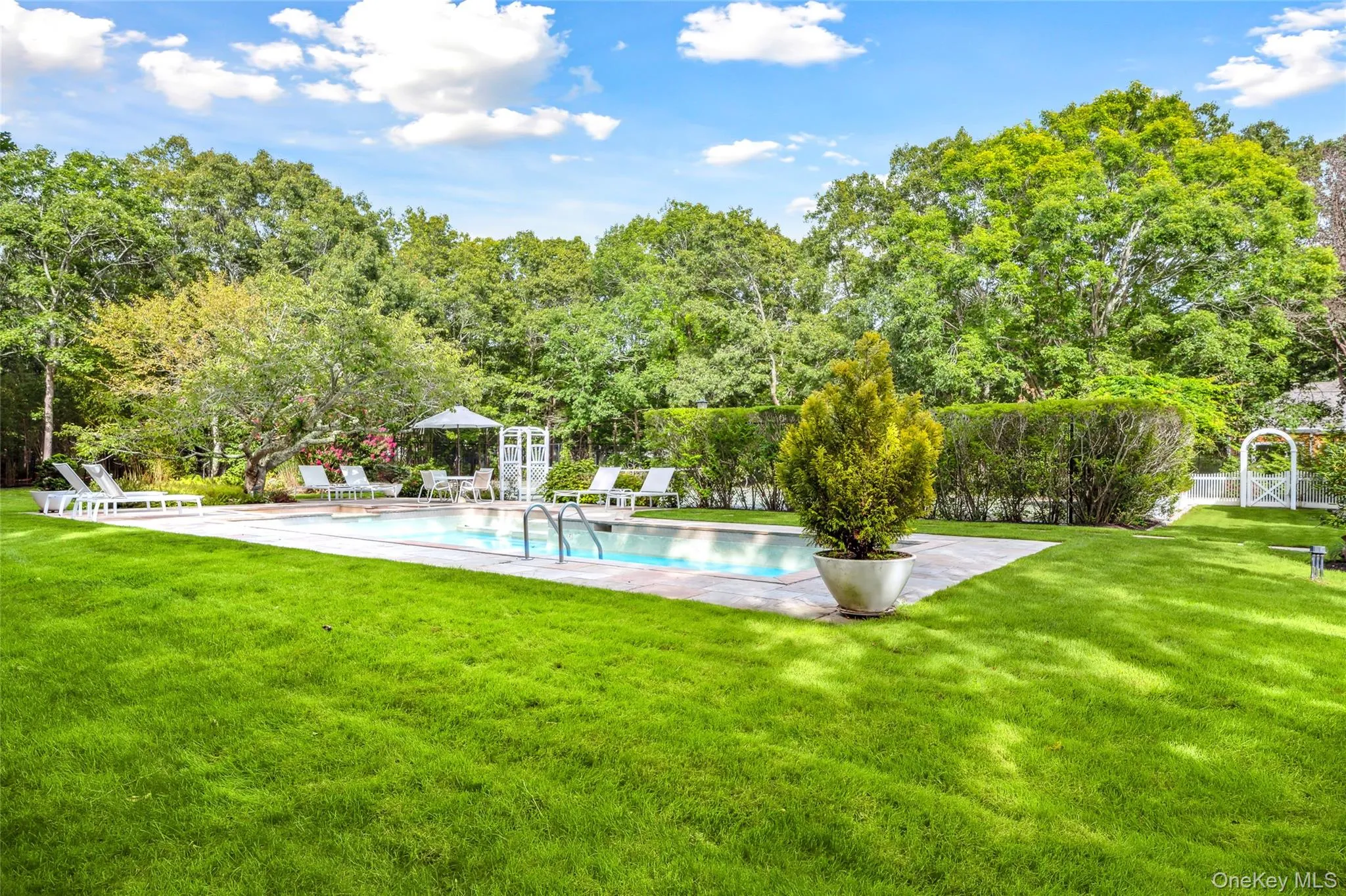 Swimming pool featuring a patio Swimming pool featuring a patio