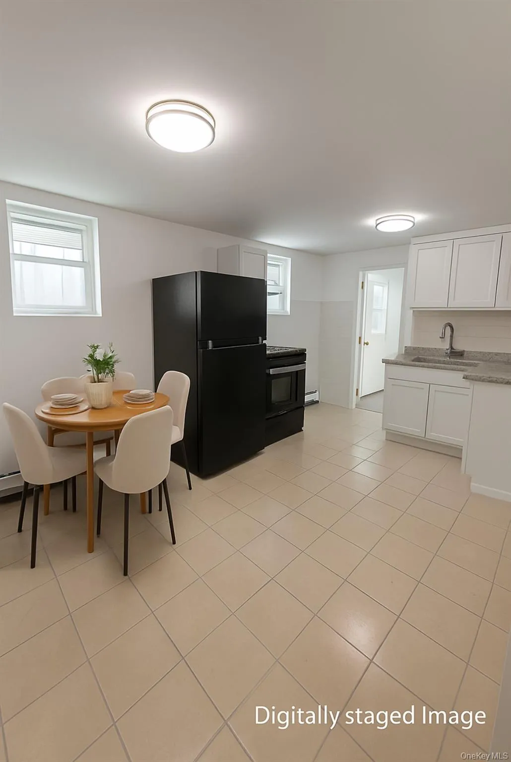 Dining space with light tile patterned floors Dining space with light tile patterned floors