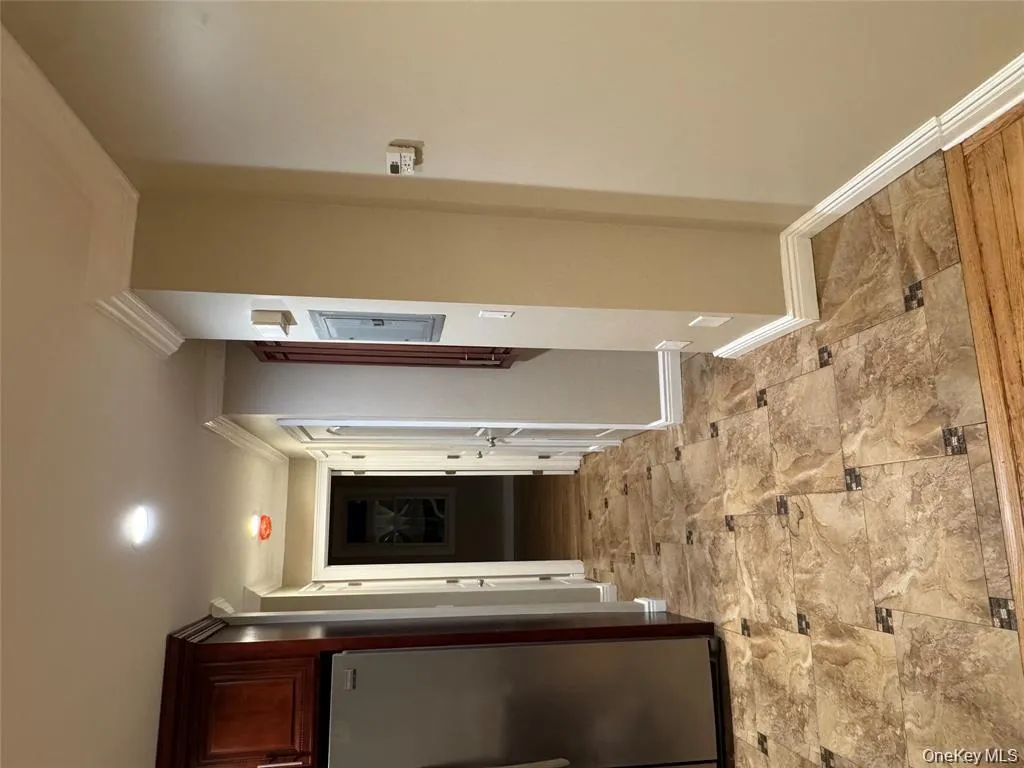 Hallway with ornamental molding and electric panel Hallway with ornamental molding and electric panel