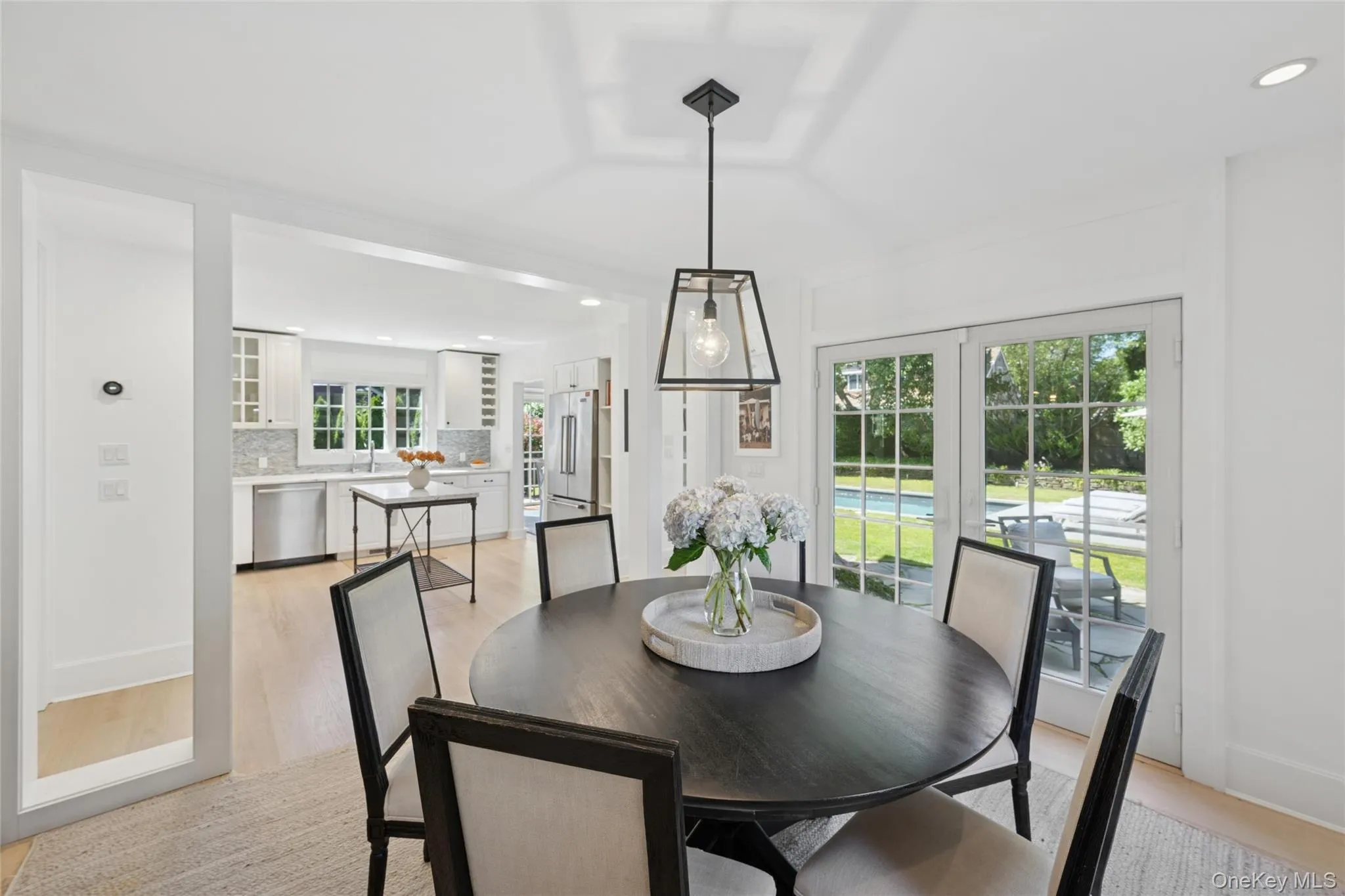 Dining space featuring recessed lighting and light wood-style flooring Dining space featuring recessed lighting and light wood-style flooring