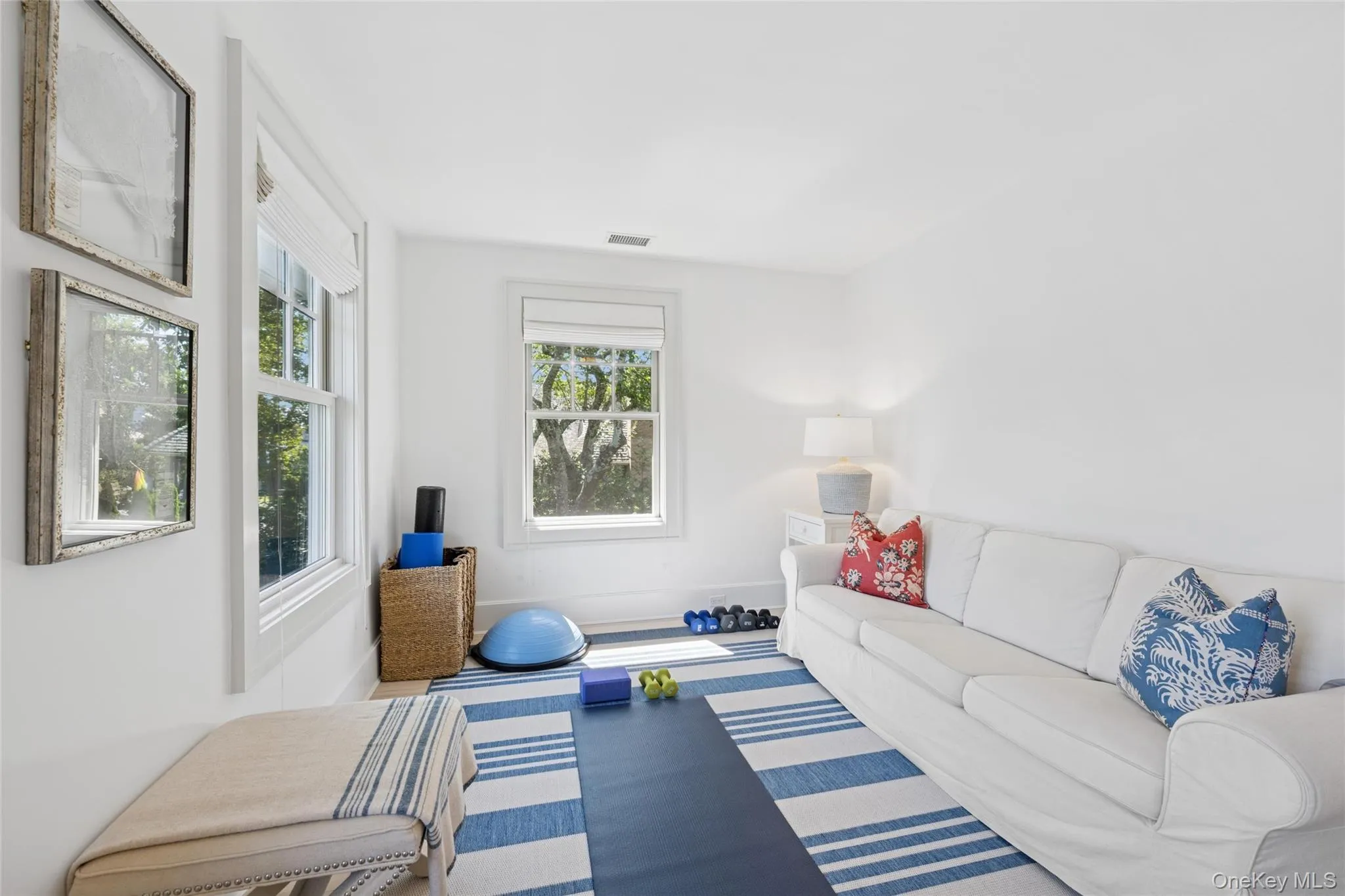 Living room featuring baseboards Living room featuring baseboards