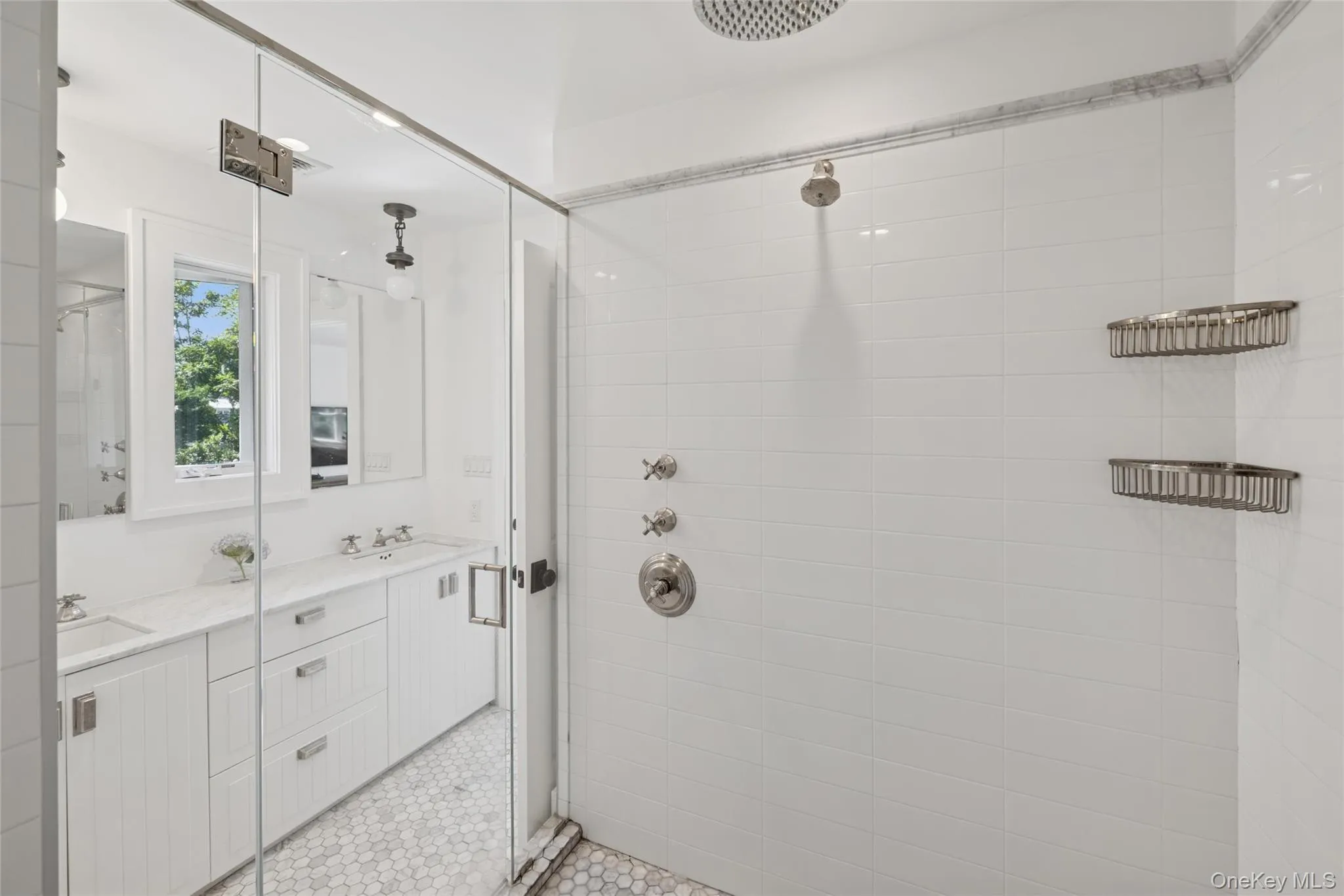 Full bath with a stall shower and double vanity Full bath with a stall shower and double vanity