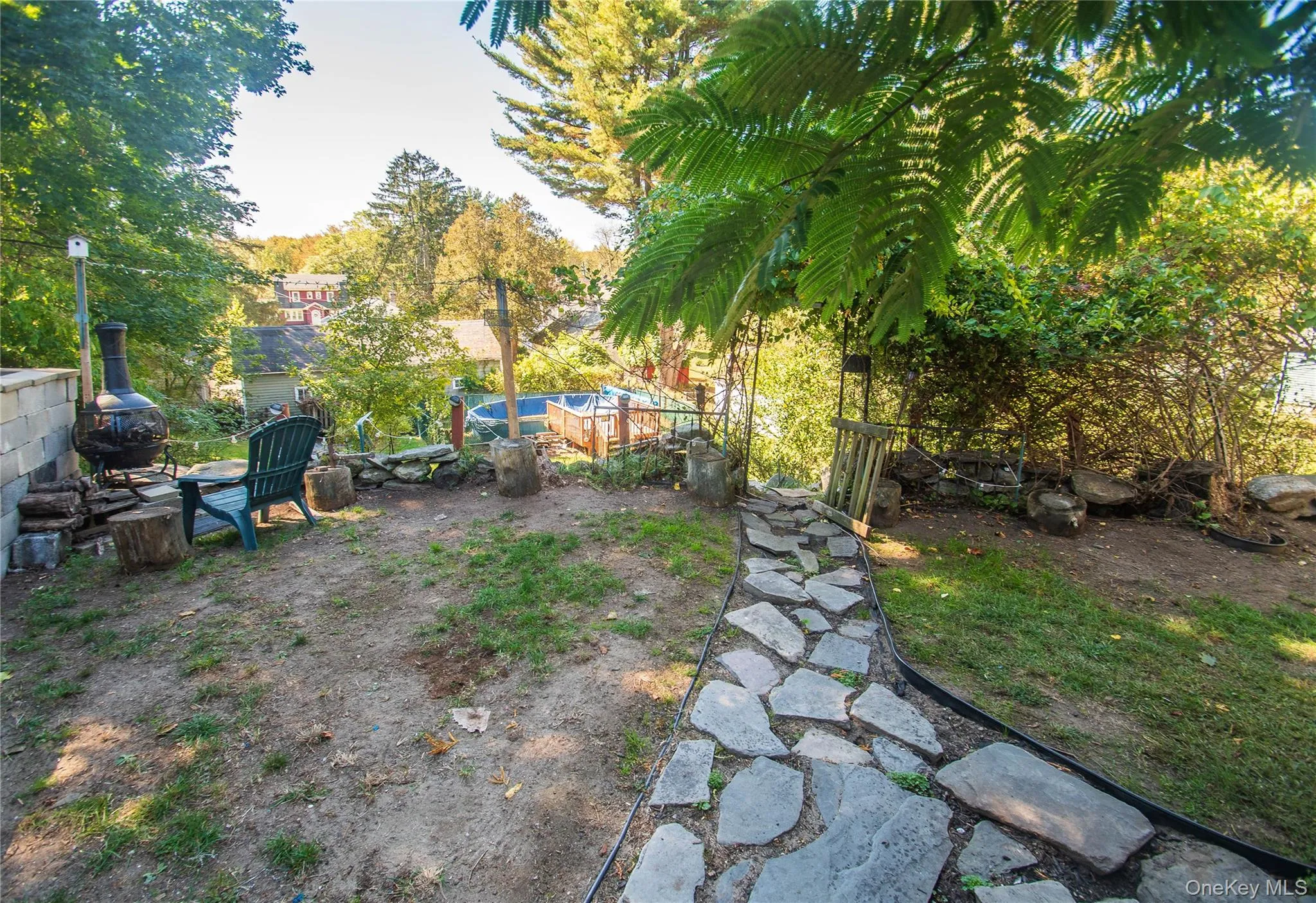 View of yard featuring a pool View of yard featuring a pool