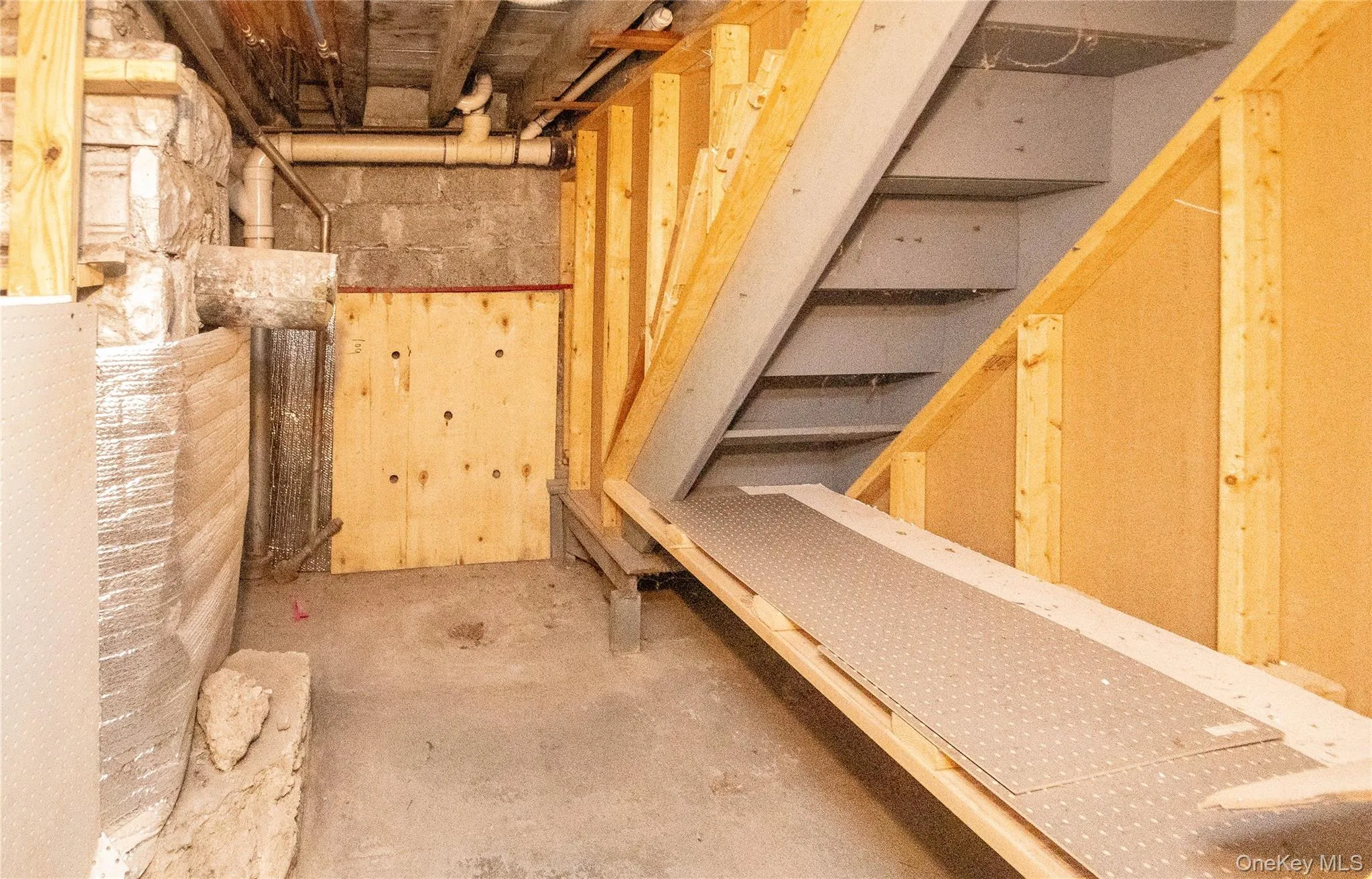 View of unfinished below grade area View of unfinished below grade area