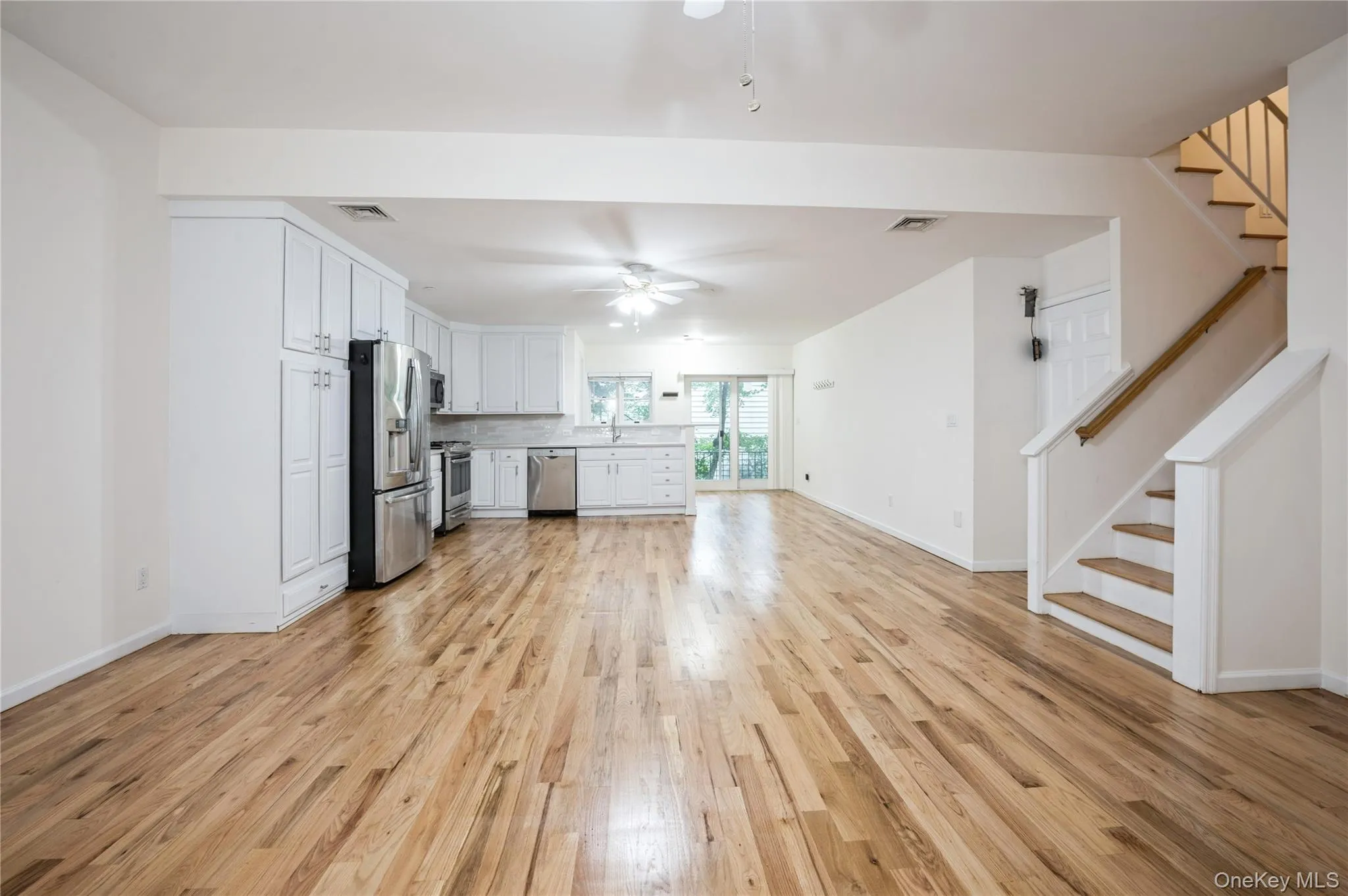 Very large living room and dining area. View to modern open kitchen, stairs to bedrooms and bathrooms Very large living room and dining area. View to modern open kitchen, stairs to bedrooms and bathrooms