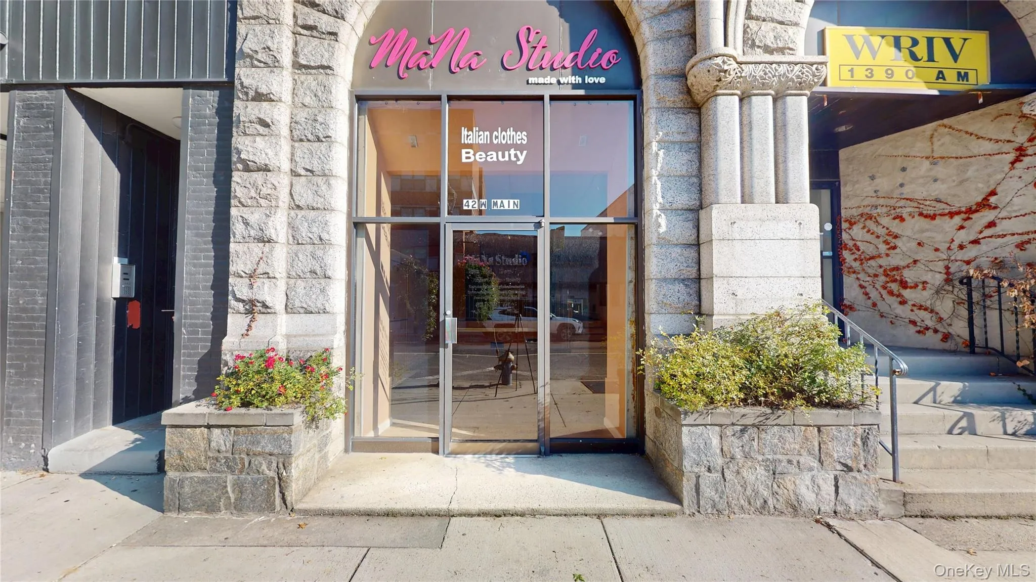 Doorway to property with stone siding Doorway to property with stone siding