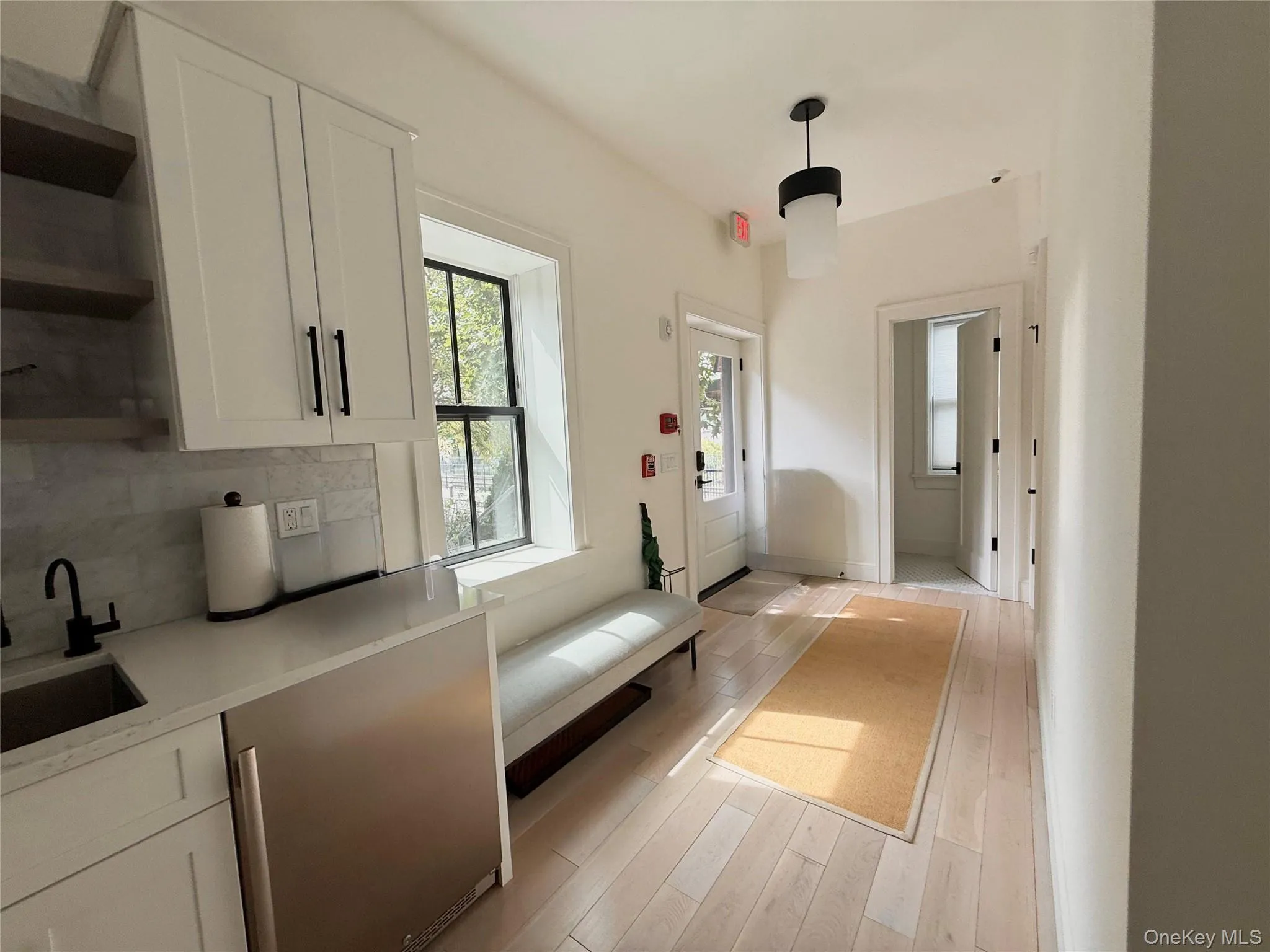 Bright and sunny entryway with access to shared bathroom Bright and sunny entryway with access to shared bathroom