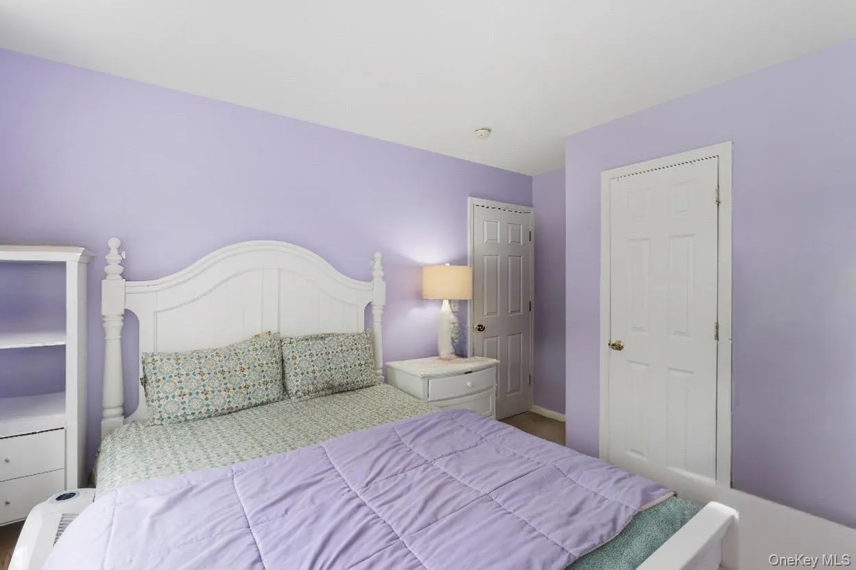 Bedroom featuring baseboards Bedroom featuring baseboards