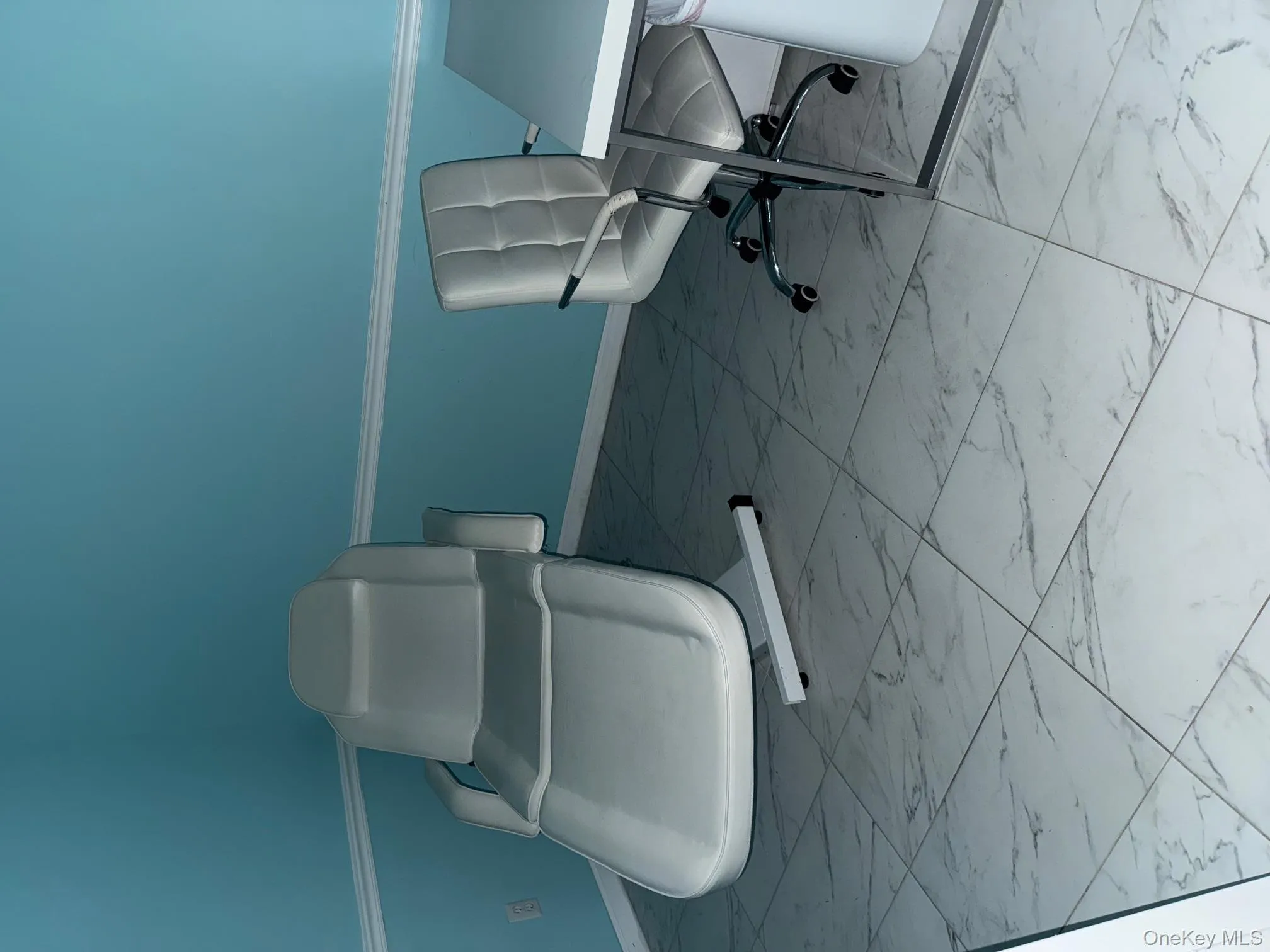 Unfurnished office with light marble finish flooring Unfurnished office with light marble finish flooring