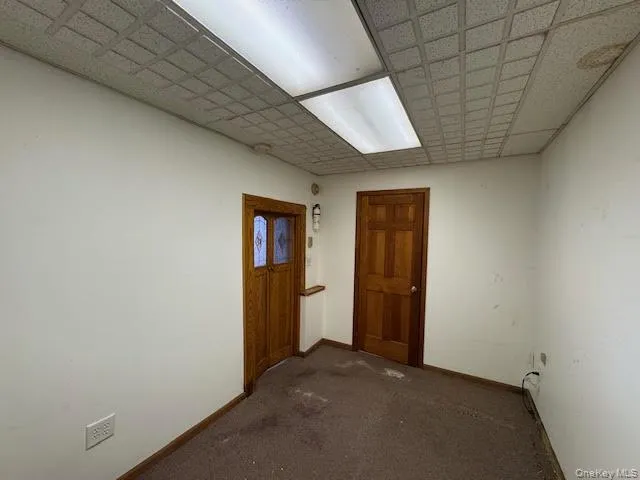 View of the second room and the entry to a smaller room before the bathroom. View of the second room and the entry to a smaller room before the bathroom.