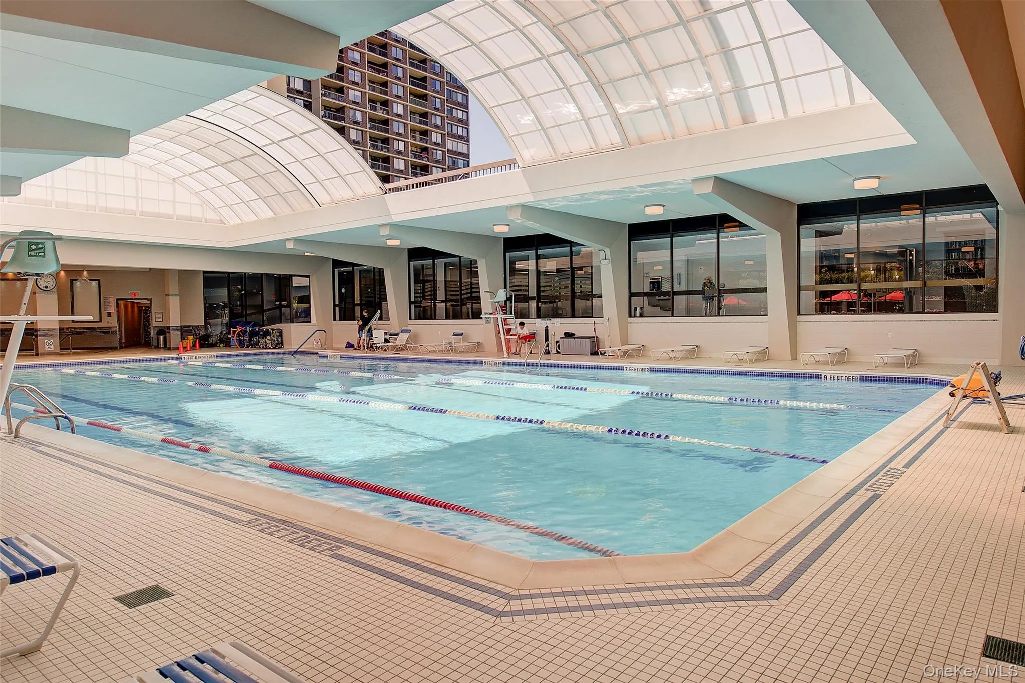 Indoor pool with a patio Indoor pool with a patio