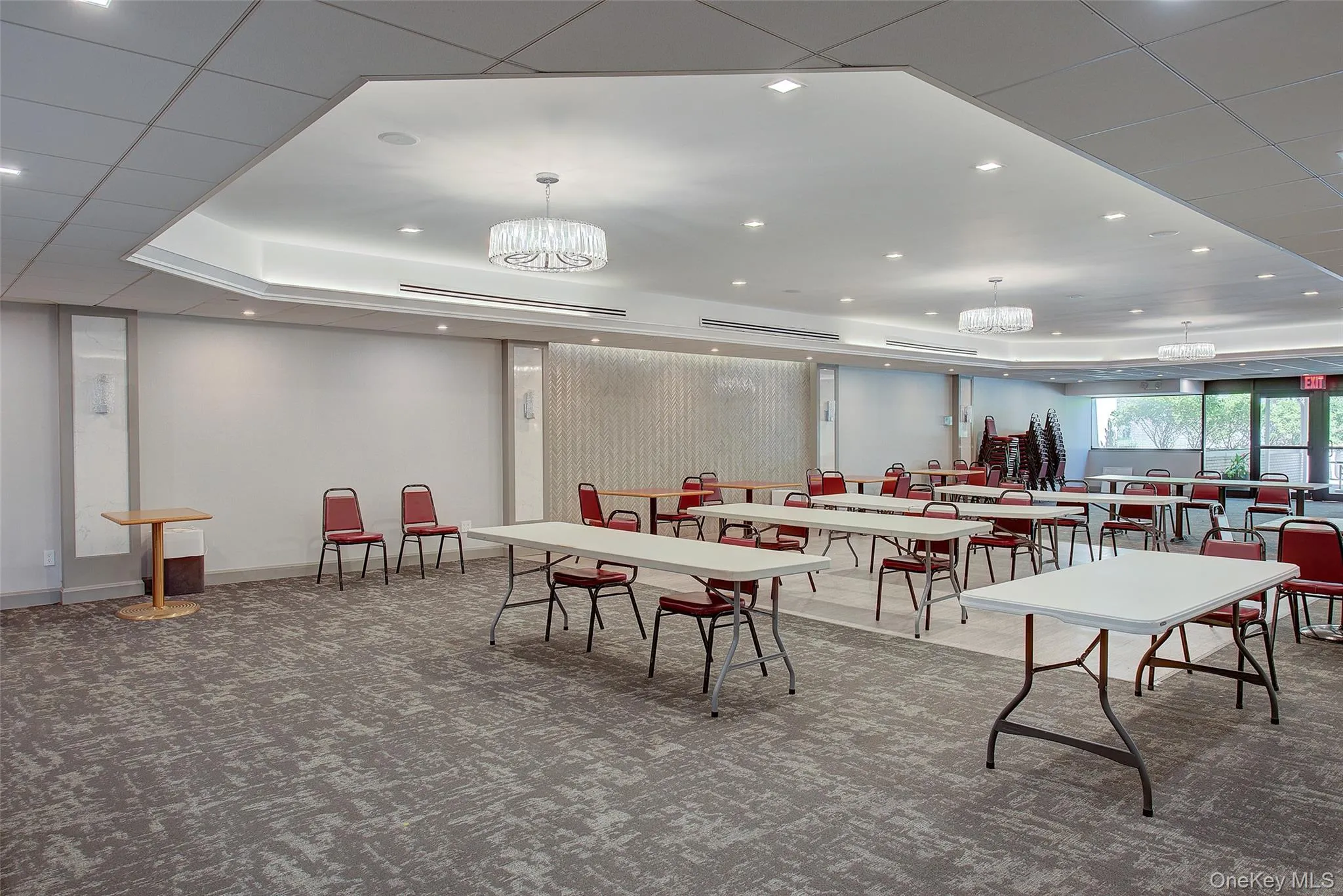 Game room with a chandelier and recessed lighting Game room with a chandelier and recessed lighting