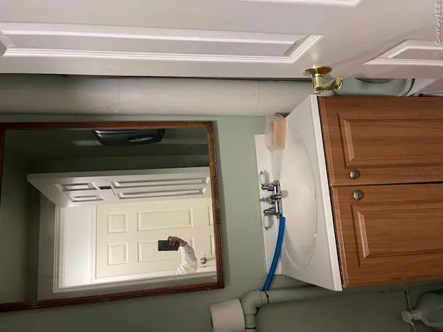 Bathroom featuring vanity and toilet Bathroom featuring vanity and toilet