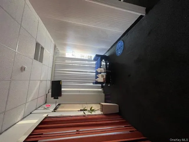 Common area with a drop ceiling Common area with a drop ceiling