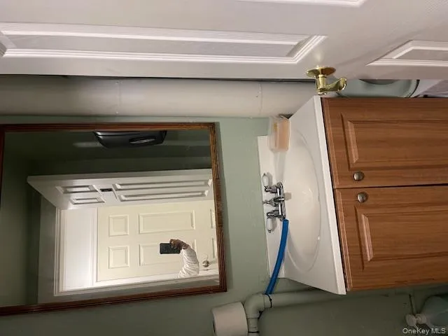 Bathroom featuring vanity and toilet Bathroom featuring vanity and toilet