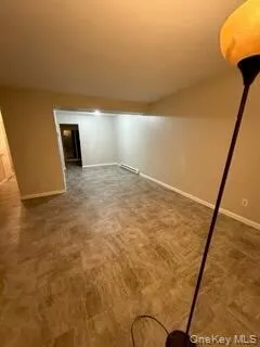 Below grade area featuring baseboards Below grade area featuring baseboards