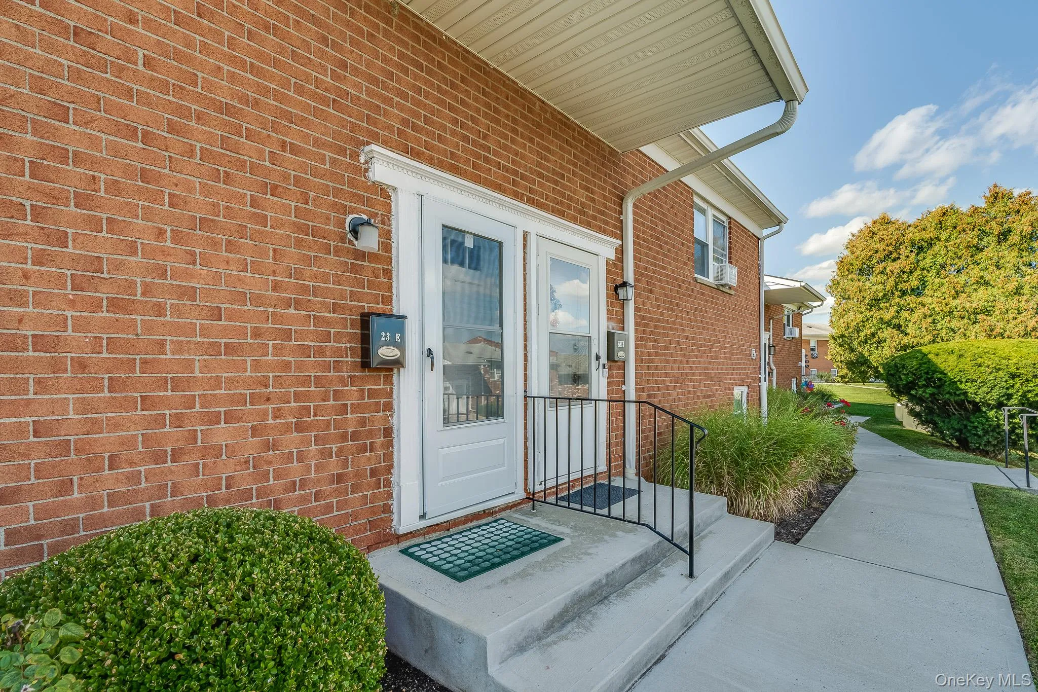 Entrance to property with brick siding Entrance to property with brick siding