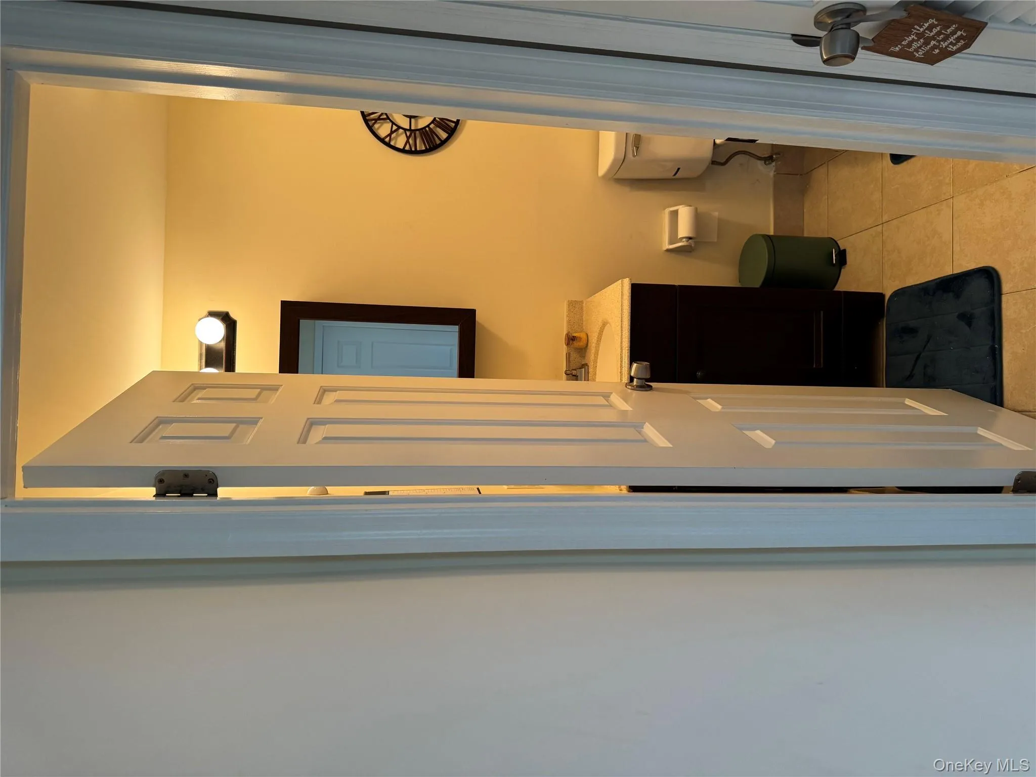 Bathroom with light tile patterned floors and vanity Bathroom with light tile patterned floors and vanity