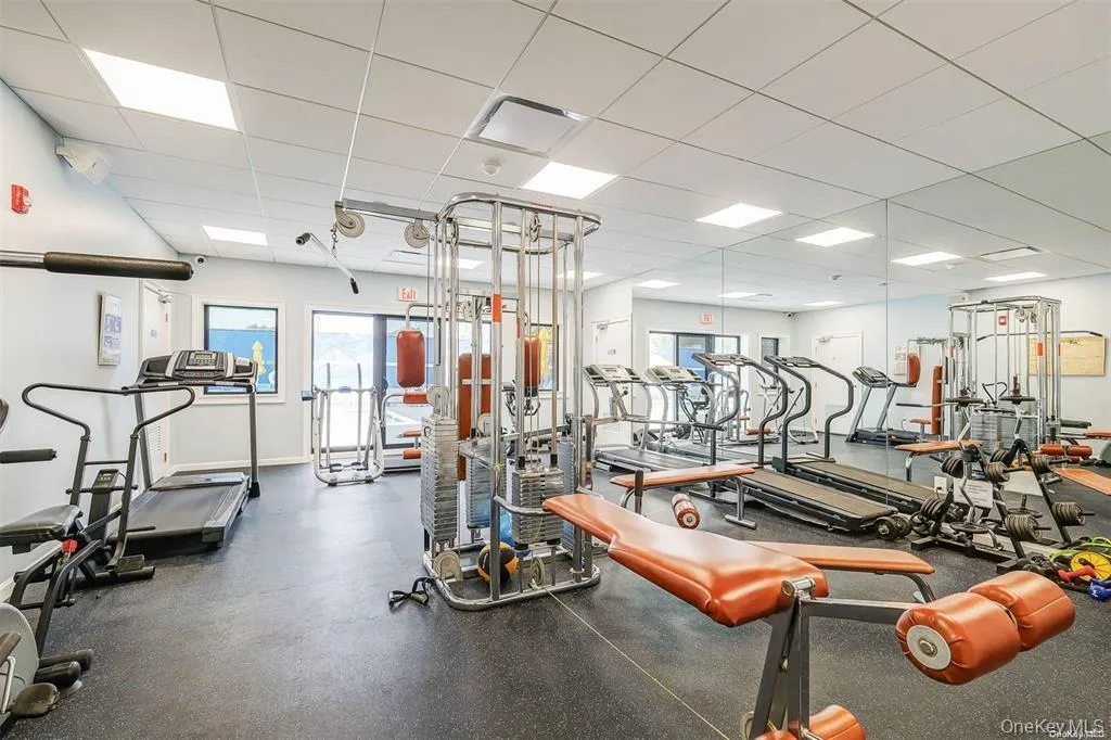 Workout area featuring a paneled ceiling Workout area featuring a paneled ceiling