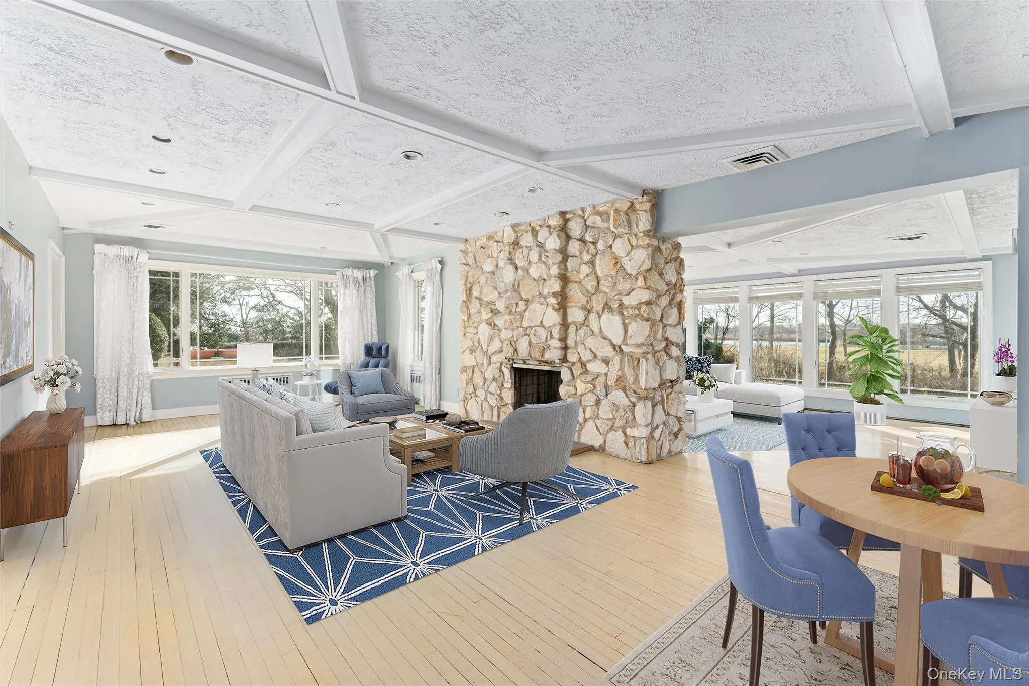 Community lobby featuring beam ceiling, coffered ceiling, and a textured ceiling Community lobby featuring beam ceiling, coffered ceiling, and a textured ceiling