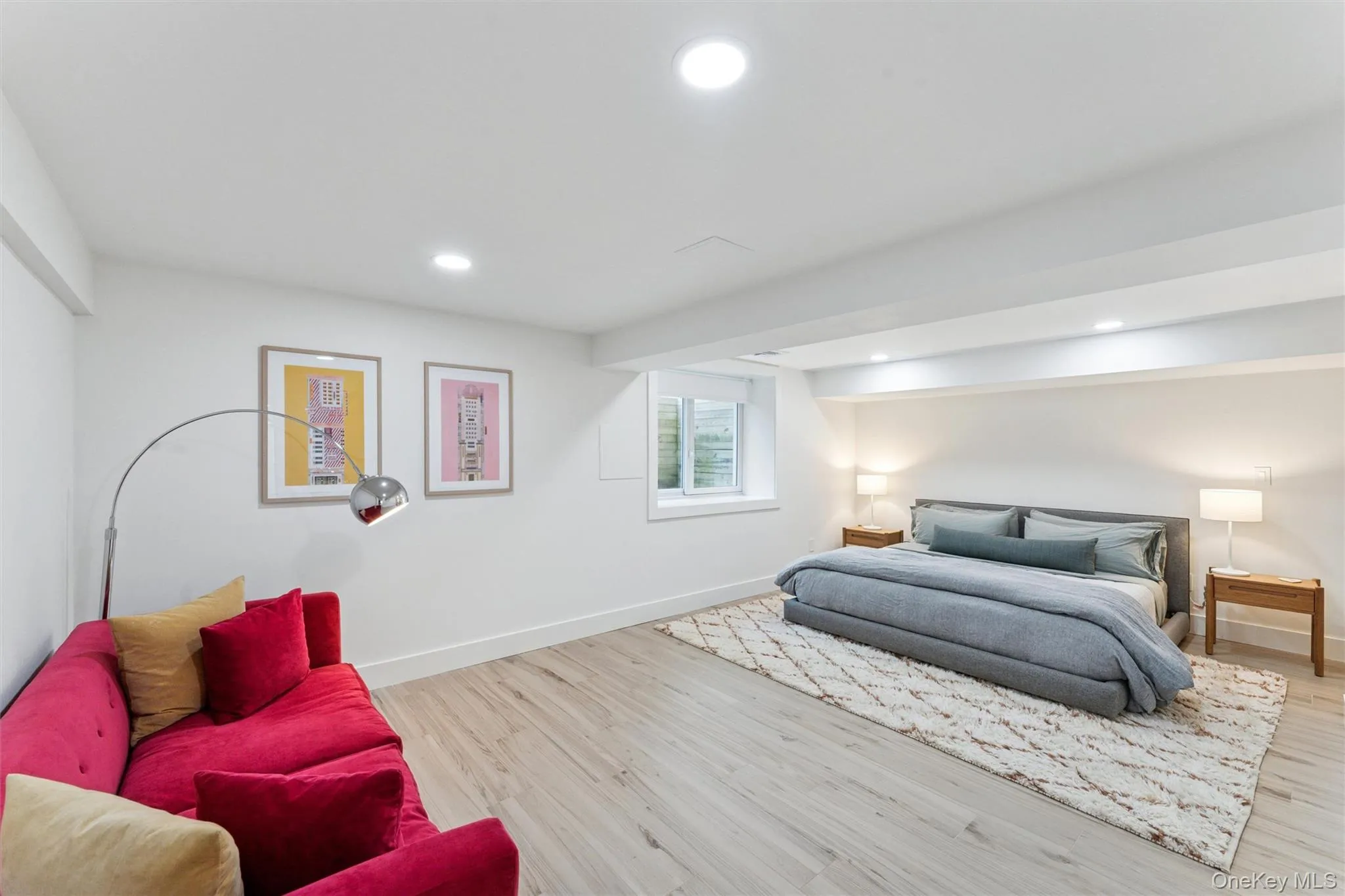 Bedroom featuring recessed lighting and light wood-type flooring Bedroom featuring recessed lighting and light wood-type flooring