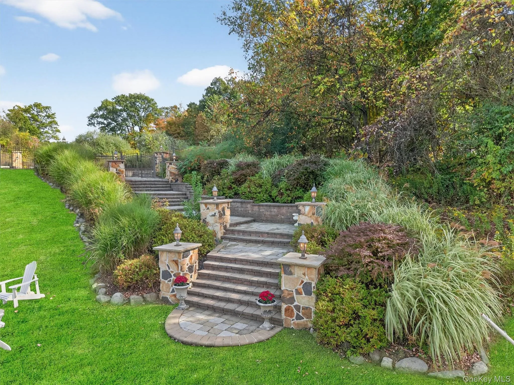 Gorgeous paver staircase to the pool and patio. Gorgeous paver staircase to the pool and patio.