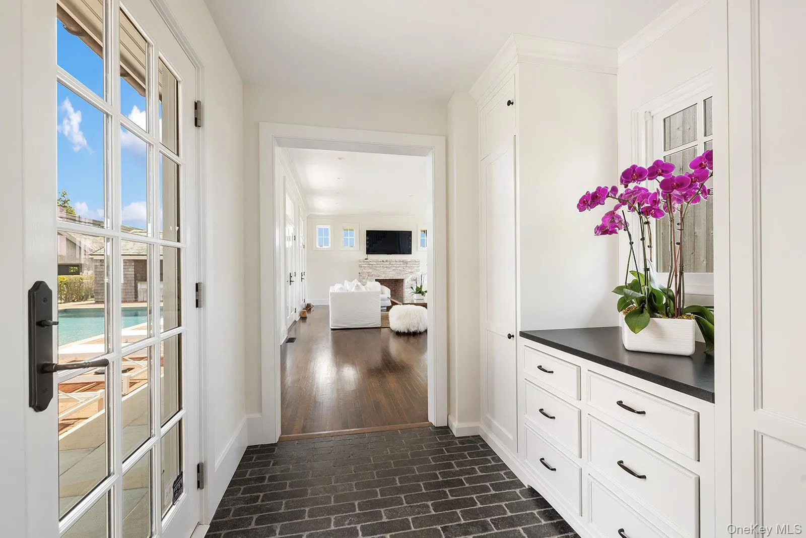 Corridor with brick floors and baseboards Corridor with brick floors and baseboards