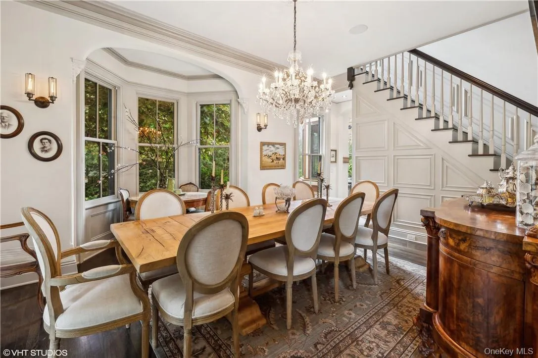 Dining room, ornamental molding, and hardwood / wood-style floors Dining room, ornamental molding, and hardwood / wood-style floors