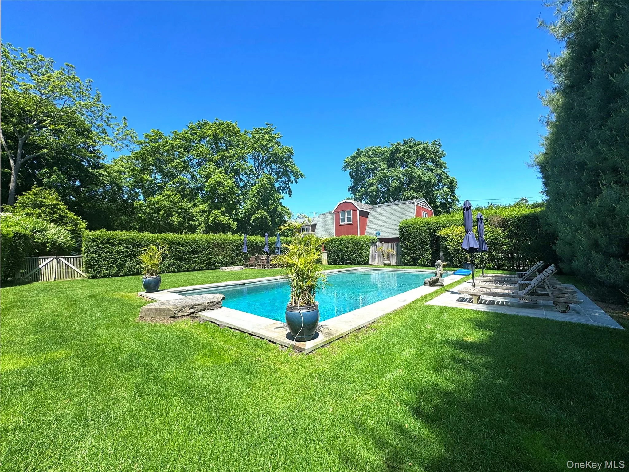 View of swimming pool featuring a patio View of swimming pool featuring a patio