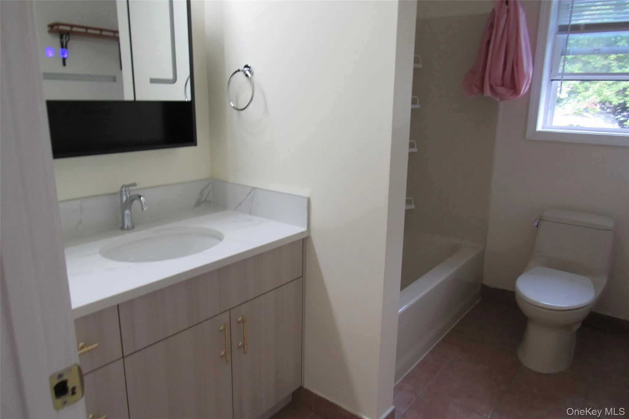 Bathroom with vanity and tile patterned floors Bathroom with vanity and tile patterned floors