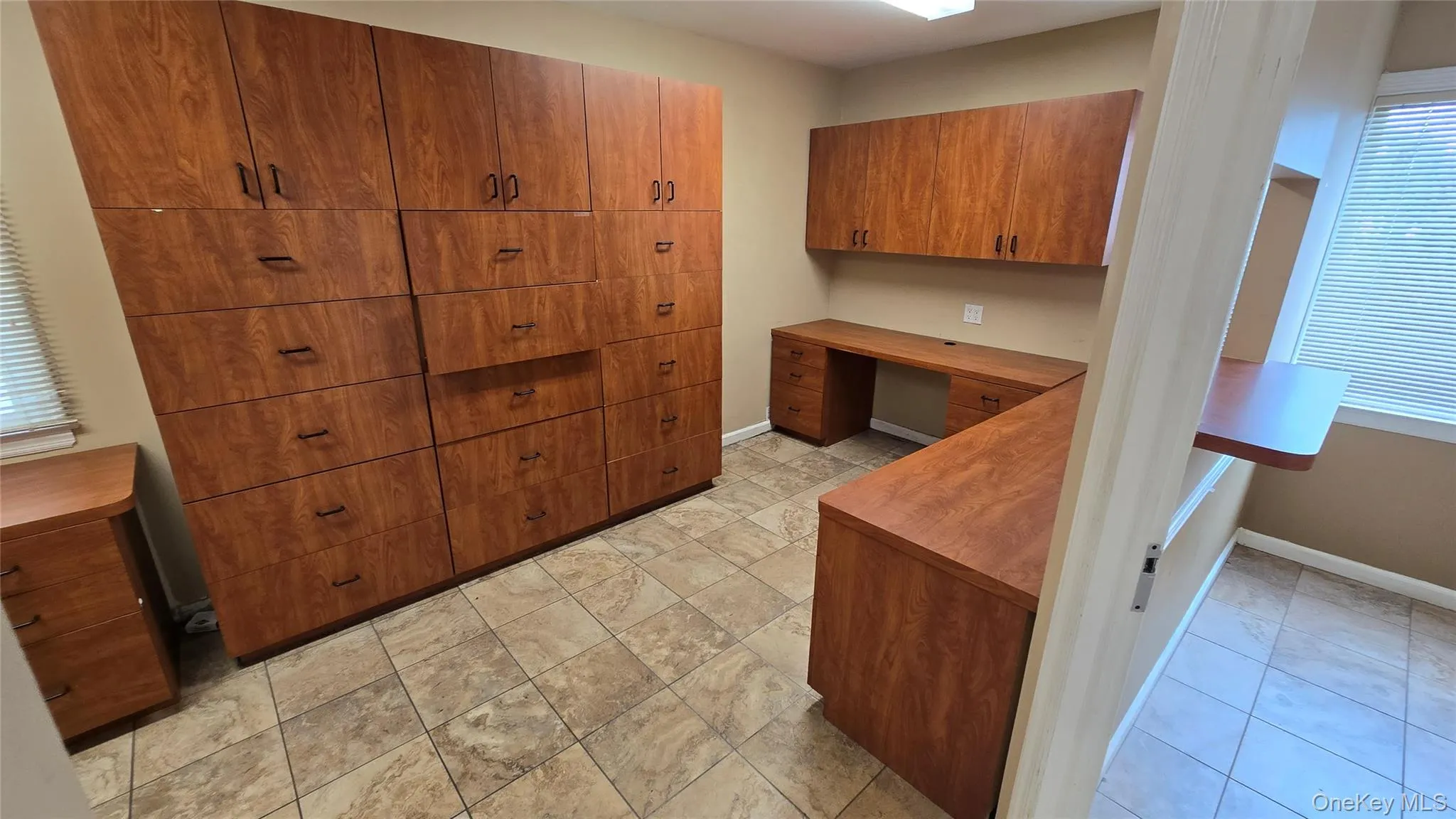 Office space featuring built in study area and healthy amount of natural light Office space featuring built in study area and healthy amount of natural light