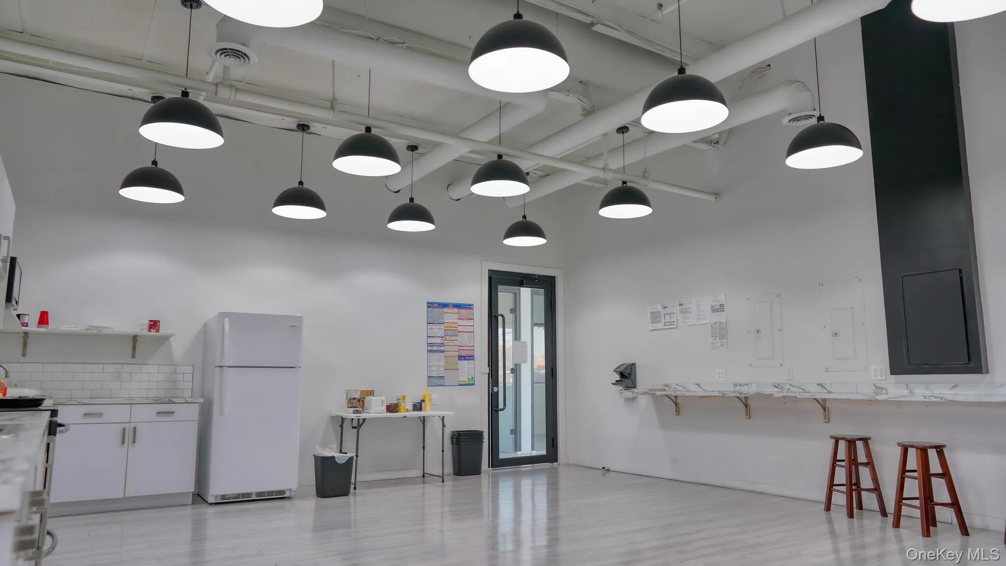 Reception featuring a towering ceiling Reception featuring a towering ceiling