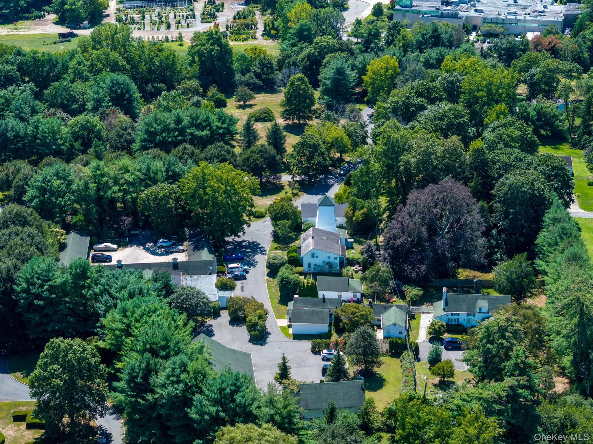 Aerial overview of property's location featuring nearby suburban area Aerial overview of property's location featuring nearby suburban area