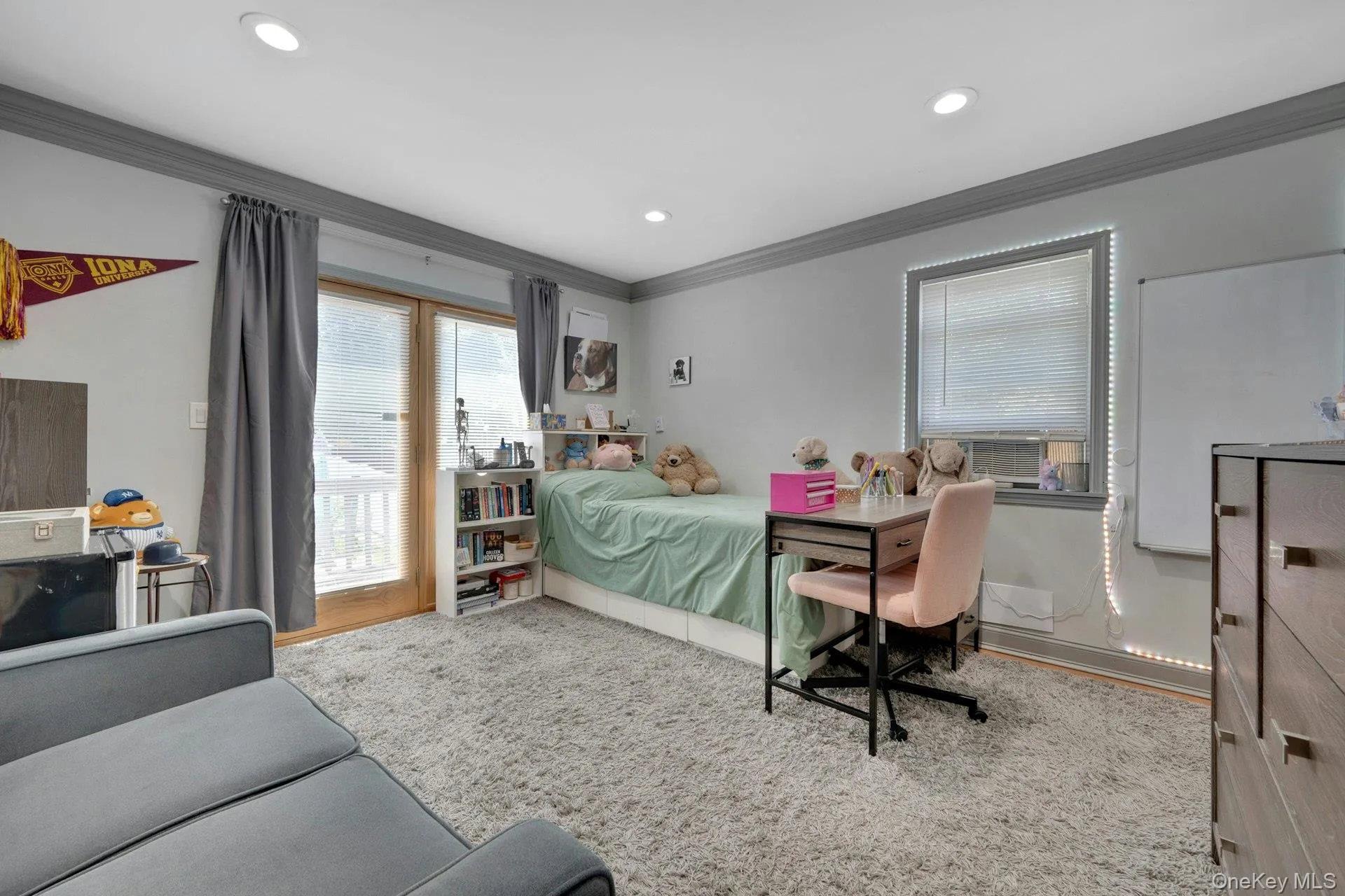 4th Bedroom located on the back side of the house with a balcony 4th Bedroom located on the back side of the house with a balcony