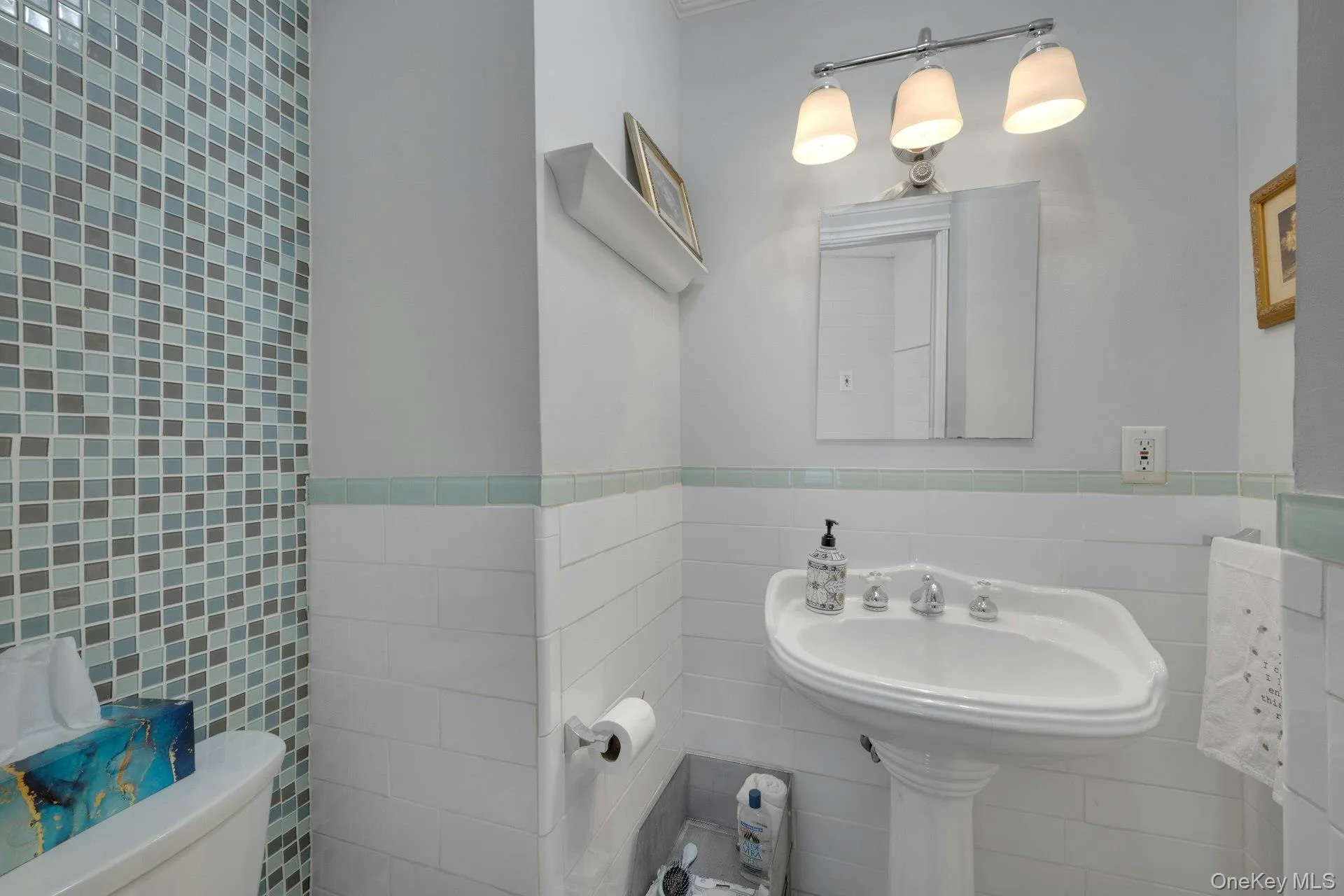 The fully renovated first floor bathroom with elegant tiling The fully renovated first floor bathroom with elegant tiling