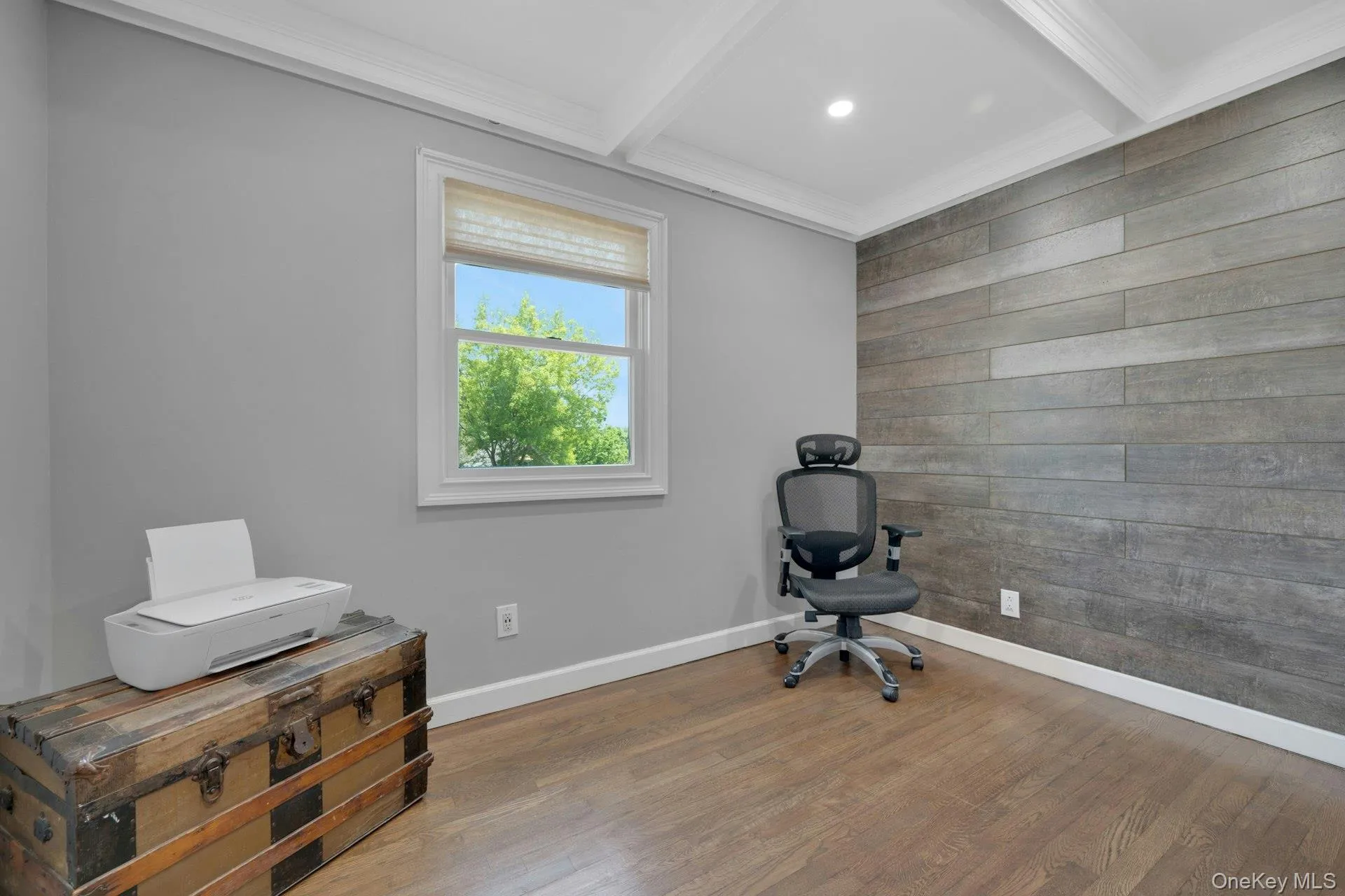 Second bedroom showing the accent wall and incredible mill work Second bedroom showing the accent wall and incredible mill work