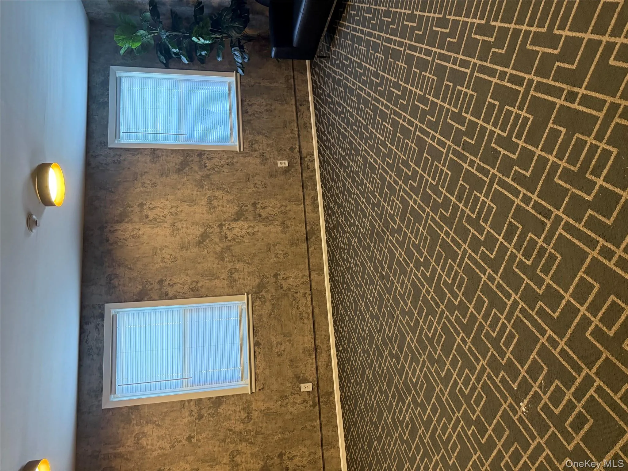 Unfurnished room featuring brick patterned floors Unfurnished room featuring brick patterned floors