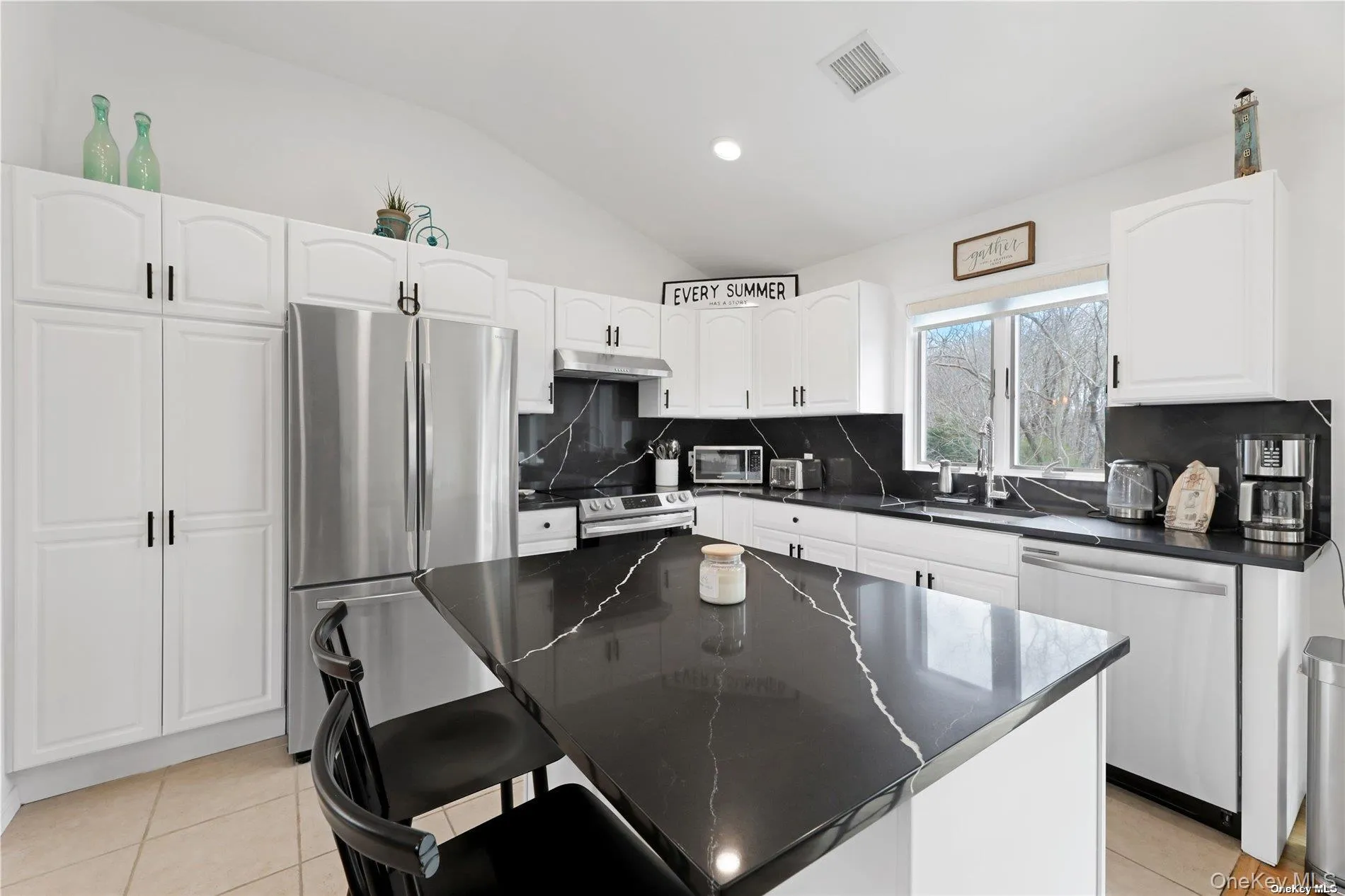 Kitchen with Island & Stainless Steel Appliances Kitchen with Island & Stainless Steel Appliances