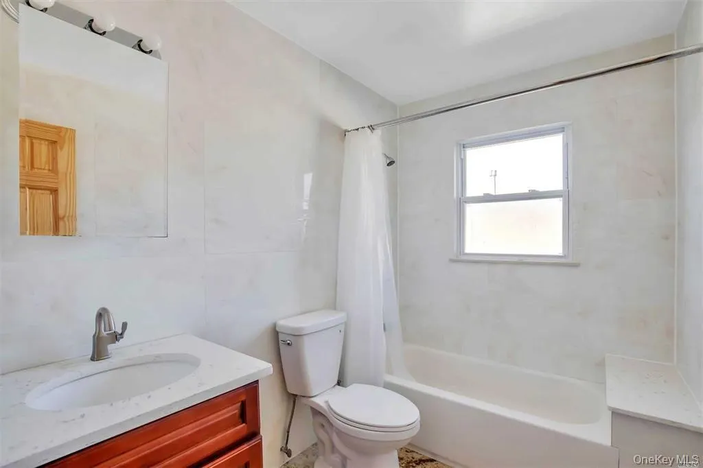 Full bath with shower / tub combo and vanity Full bath with shower / tub combo and vanity